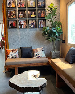 Cozy salon lounge with family photo wall